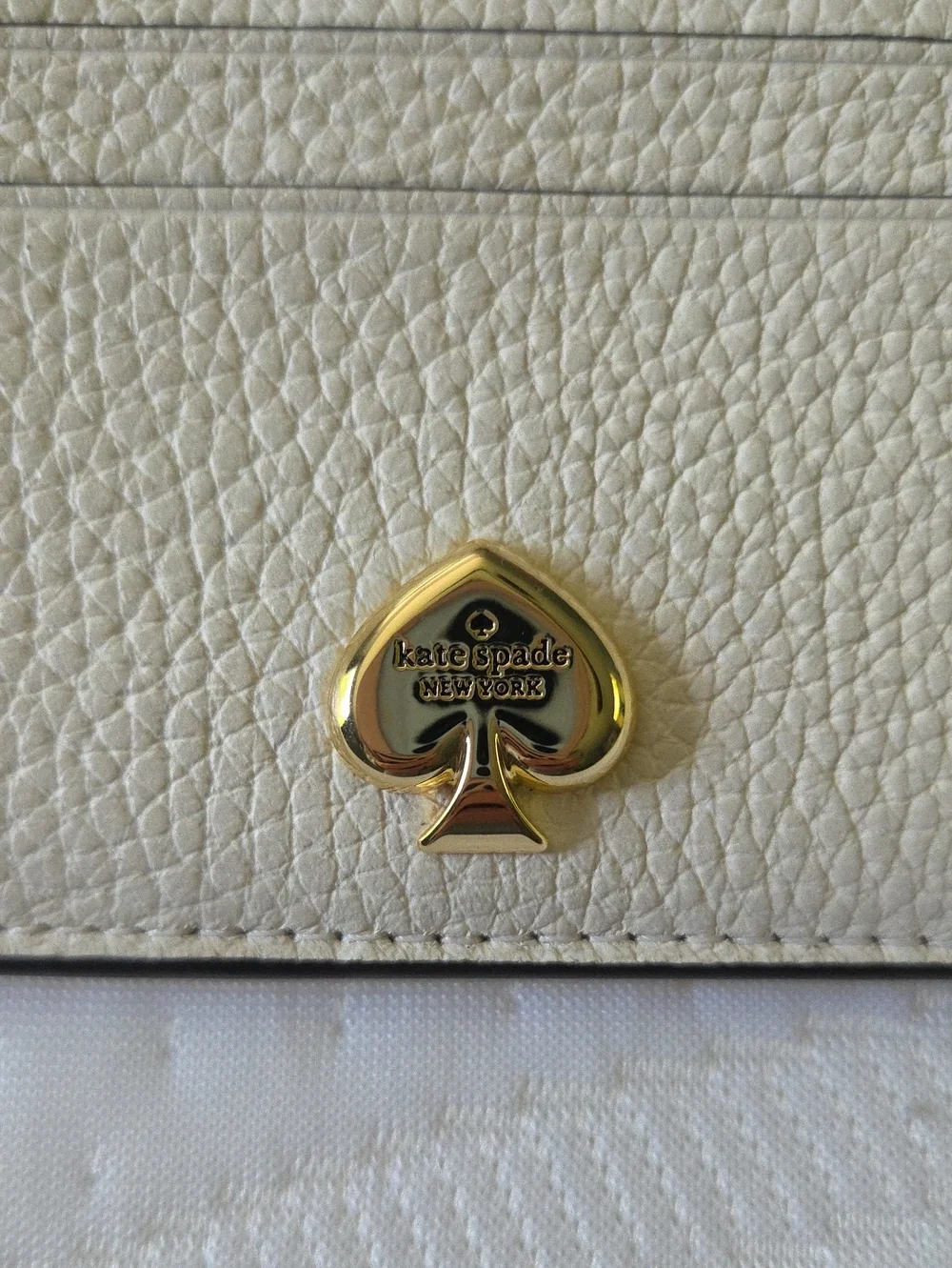 Kate Spade Pebbled Leather Ceam Card Wallet with Gold Spade Logo